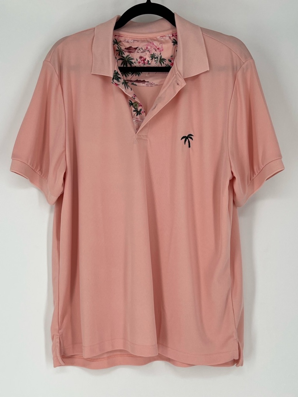 Albert Morris, pink polo w/ tropical flamingo print inside the collar &  placket
